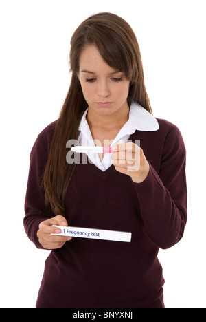 Fille de l'école de lire le résultat d'un test de grossesse Banque D'Images