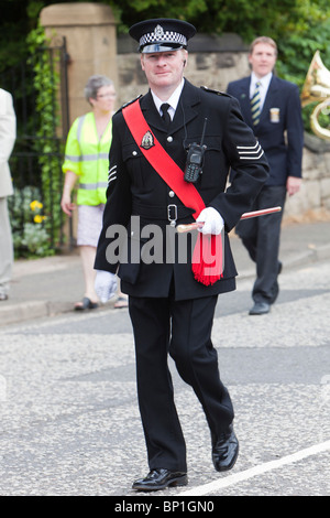 Agent de police mène au défilé Banque D'Images