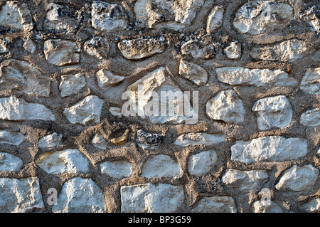Jardin de pierre aléatoire inégale détail mur - France. Banque D'Images