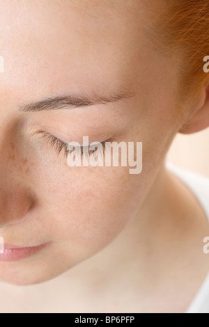 Détail d'un visage de femme rousse Banque D'Images