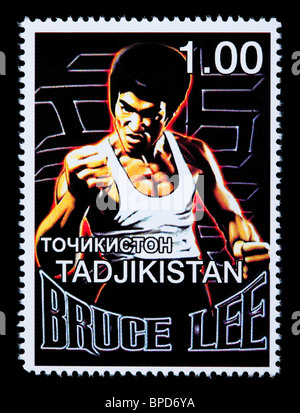 TADJIKISTAN - circa 2000 : un timbre-poste imprimé dans le Tadjikistan montrant Bruce Lee, circa 2000 Banque D'Images