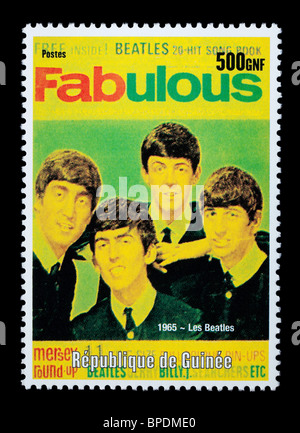 République de Guinée - circa 2001 : un timbre-poste imprimé en Guinée montrant les Beatles, vers 2001 Banque D'Images