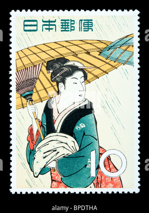 Japon - VERS 1966 : un timbre-poste imprimé au Japon montrant une peinture d'une femme japonaise, vers 1966 Banque D'Images