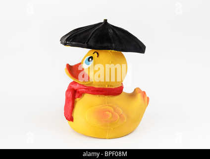 Canard en caoutchouc jaune avec parapluie Banque D'Images