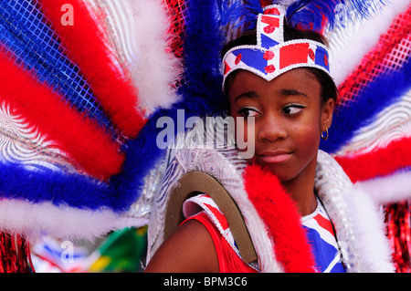 Portrait d'une fille danseuse au Notting Hill Carnival Children's Day Parade, London, England, UK Banque D'Images