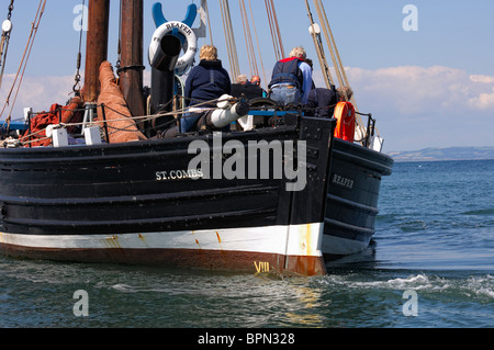 Le moissonneur voilier quittant le port de North Berwick, Firth of Forth, Ecosse Banque D'Images