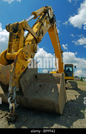 Gros chargeur avant sur un nouveau site de construction Banque D'Images