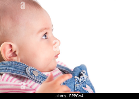 Cute baby girl vêtue de jeans Banque D'Images