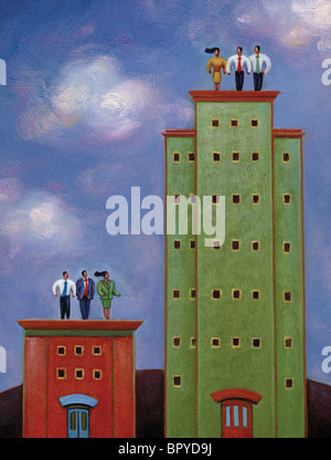 Deux groupes de gens d'affaires l'article sur les bâtiments de hauteurs différentes Banque D'Images