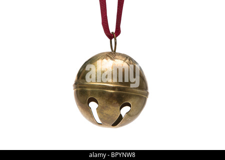 Sleigh bell Christmas ornament hanging par un ruban rouge Banque D'Images