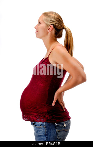 Femme enceinte sur fond blanc Banque D'Images