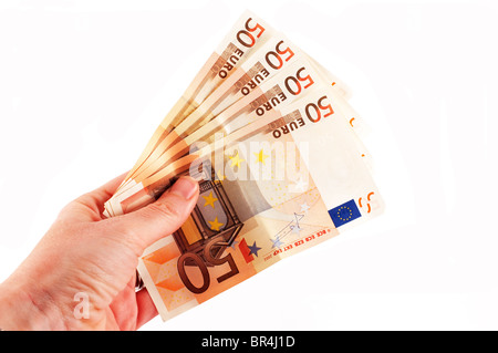 Cinquante billets détenus dans une main féminine Banque D'Images