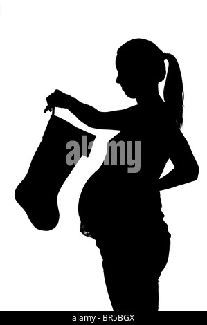 Femme enceinte sur fond blanc Banque D'Images