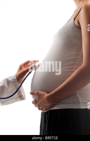 Pregant woman with doctor with stethoscope Banque D'Images