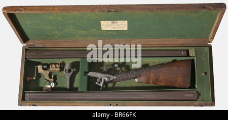 Un système Lefaucheux : un fusil à double barre de Damas avec des canons à injection interchangeables, dans son étui en bois, John Donaghy, Amsterdam, no PH35. Les deux ensembles de tonneaux fabriqués à partir de Damascus de rose plus fin et cannelé : canons de fusil, 8 rainures en 15 mm cal., optiquement partiellement lumineux ou rugueux, nécessitent un nettoyage, longueur 74,5 cm. Barriques de grenaille de 17 mm cal., lumineux, longueur 77 cm. Double déclenchement. La nervure du canon à fusil avec les vues arrière repliables, signée en lettres d'or gothiques « John Donaghy Amsterdam », la nervure du canon à tir est signée « mas Turc ». Verrouillage en T. Cadre lumineux gravé le plus fin avec g, Banque D'Images