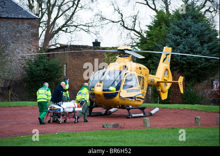 Hélicoptère Ambulance Service écossais assiste à un incident dans South Lanarkshire , Écosse Banque D'Images