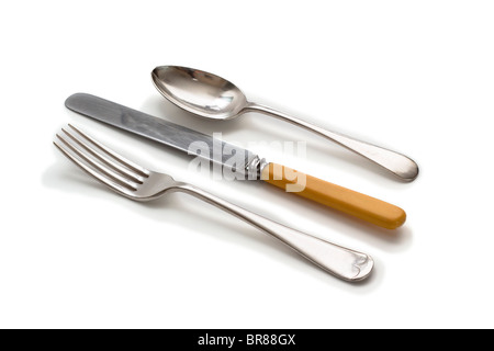 Couteau, fourchette, et cuillère. Plaque d'argent à l'ancienne avec couteau au manche d'ivoire, Banque D'Images