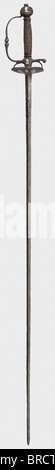 Une petite épée avec hilt argenté, Europe du Nord, environ 1700 lame triangulaire mince (quelque peu corrodée). Noeud-fusée ciselé avec incrustations argentées (usées). Un buste au milieu de la décoration ornementale et des trophées martiaux est représenté d'un côté de la double coquille-garde, porte-fusée et pommel. Couvercle de poignée en fer plus tard. Longueur 101,5 cm. Historique, historique, XVIIIe siècle, robe épée, épées, throuillage, propulsions, petite épée, épée de cour, arme, armes, armes, armes, armes, militaire, militaria, objet, objets, photos, coupures, coupures, découpe, découpe, découpes, coupures, coupures, coupures, Banque D'Images