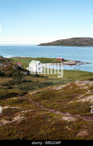 Maison sur l'île de Vanna / Vannoya Comté de Troms, Norvège du Nord. Banque D'Images