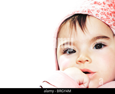 Petite fille closeup portrait sur fond blanc Banque D'Images