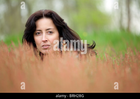 Beautiful woman posing in meadow, selective focus Banque D'Images