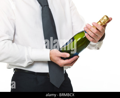 Businessman with champagne bouteille sur fond blanc Banque D'Images