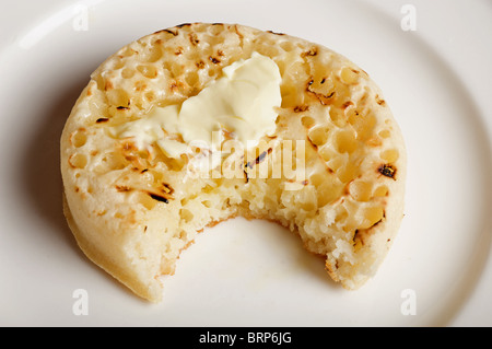 Crumpet beurré grillé Banque D'Images