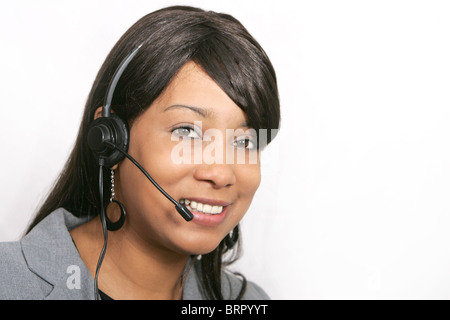 Une femelle adulte représentant du service à la clientèle portrait portrait avec son casque sur prêts à travailler Banque D'Images