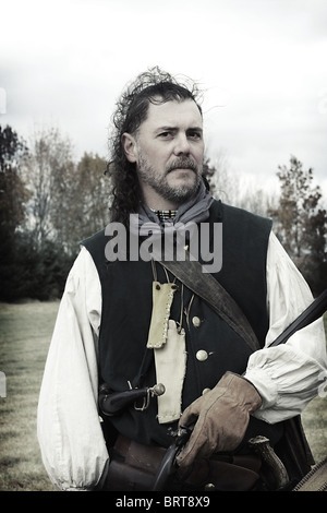 Trappeur fourrure mâle reenactor en noir et blanc Banque D'Images