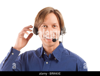 Portrait of a young businessman travaillant dans un centre d'appel Banque D'Images