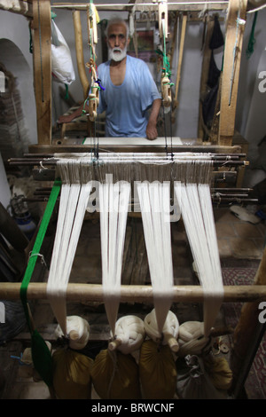 Weavery de tapis en Afghanistan Banque D'Images