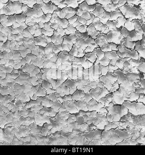 La texture du mur de béton gris couverts de peinture craquelée Banque D'Images