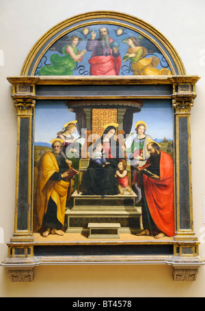 La Madone et lEnfant ont intronisé avec les Saints, ca. 1504, retable de Raphael Banque D'Images