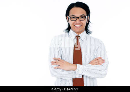 Beau jeune businessman smiling, portrait Banque D'Images