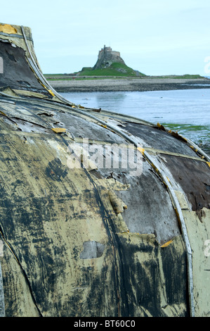 Bateau à rames ouvertes Northumberland Lindisfarne île de marée de la côte du Nord-Est de l'Angleterre, l'Île Sainte paroisse civile. Parker Chronicle P Banque D'Images