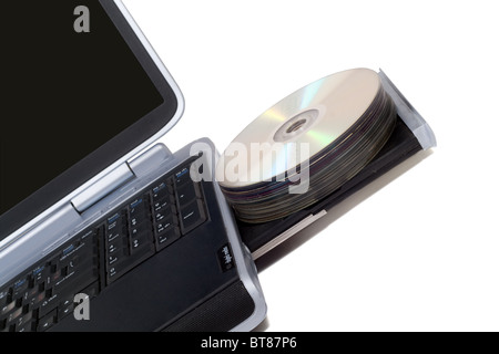 Ordinateur portable avec lecteur DVD surchargés. Isolated on white Banque D'Images
