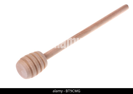 Cuillère en bois pour le miel isolé sur fond blanc Banque D'Images