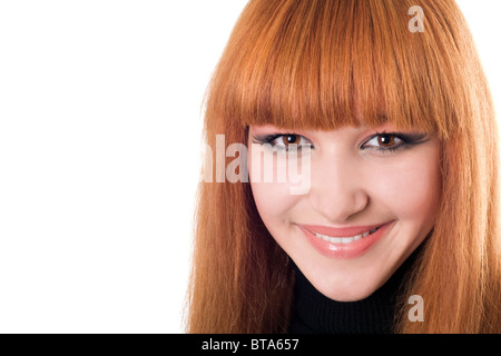 Portrait de la belle femme rousse de sourire Banque D'Images