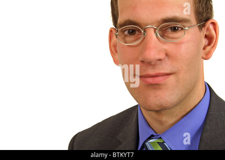 Un jeune homme d'affaires motivés in front of white background. Banque D'Images