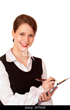 Attractive smiling business woman écrit dans l'annexe. Isolé sur fond blanc. Banque D'Images