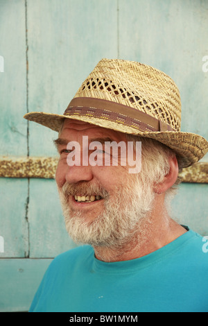 L'homme à chapeau de paille Banque D'Images