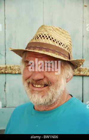 L'homme à chapeau de paille Banque D'Images