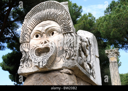 Masque en pierre de théâtre, théâtre, Ostia Antica Banque D'Images