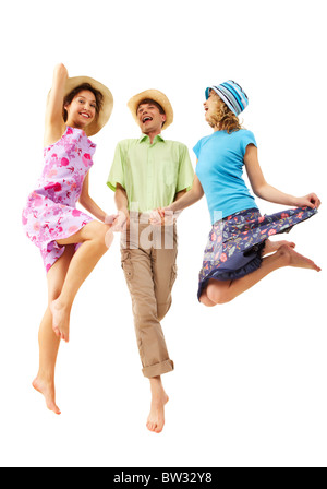 Portrait of joyful in jump holding homme heureux par les mains dans l'isolement Banque D'Images