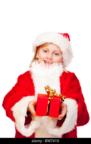 Young happy girl dressed as Santa Claus détient cadeau de Noël dans les mains. Isolé sur fond blanc. Banque D'Images