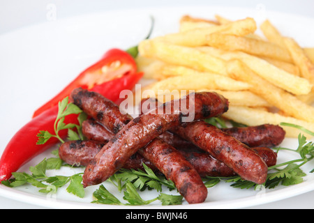 Merguez grillé avec frites Banque D'Images