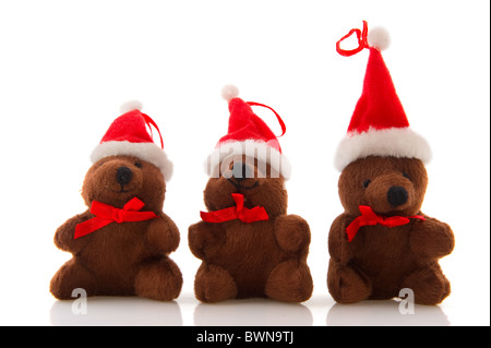 Peu de rangs avec l'ours de noël santa claus hat Banque D'Images