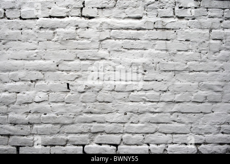 Vieux mur de briques peint en blanc Banque D'Images