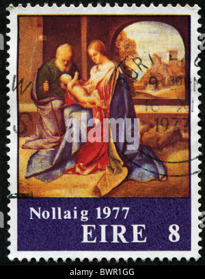 Irlande - circa 1977 Voeux de Noël : un timbre-poste imprimé en Irlande montre Sainte Famille, vers 1977 Banque D'Images