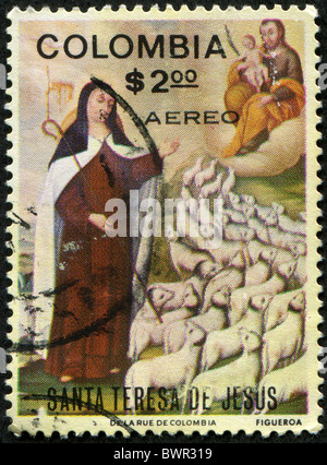 Colombie - Circa 1980-s : un voeux de Noël de timbres en Colombie montre peinture par Santa Teresa de Jésus, vers 1980-s Banque D'Images